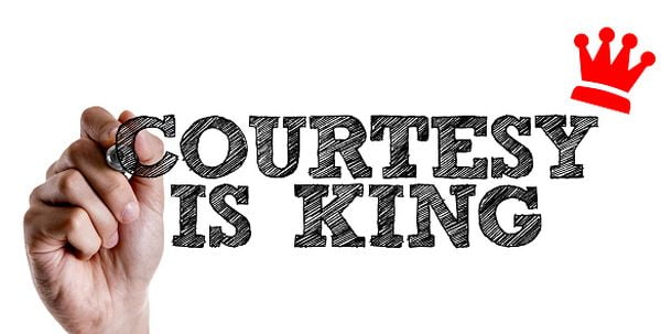 an artwork of courtesy is king signage