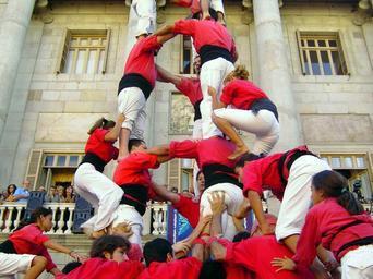 castellers in placa sant is an example of how people help people